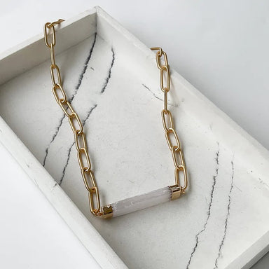 This beautiful Paperclip Chain Necklace with a Selenite Connector is the perfect addition to any outfit. With its elongated paperclip link chain and unique Selenite connector, this necklace is sure to turn heads. Its unique design is perfect for an unforgettable look!  Solid Brass 18” Long 