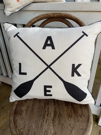 Square Pillow with Lake and Oars in black text with black piping