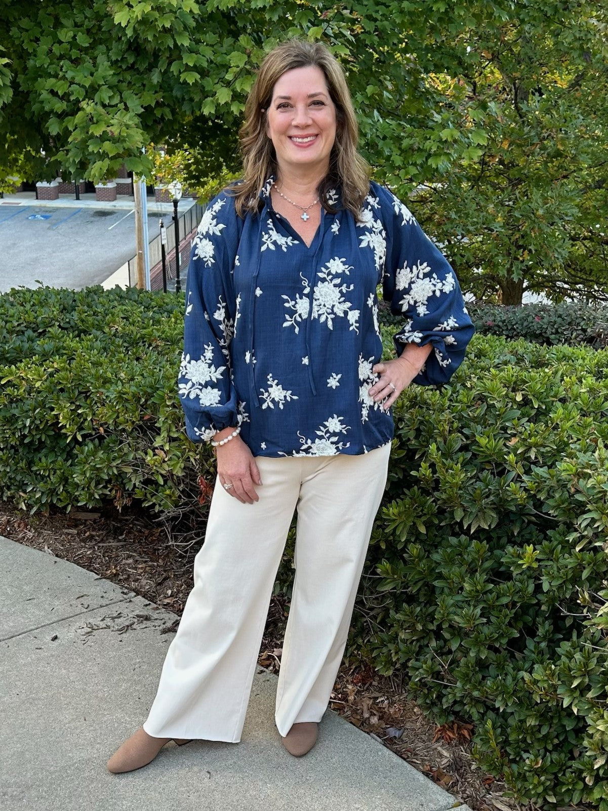 Embroidered Ruffle Tie Neck Blouse