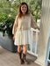 Effortlessly chic and versatile, our Comfy Round Neck Drop Shoulder Crop Mini Dress features a seashell and off-white color. With a round neckline, drop shoulder design, and ribbed neckline, cuffs, and hemline, this dress is perfect for all seasons. The long balloon sleeves add a touch of drama to the loose tunic style, making it a must-have for your wardrobe!

Material: 70% Polyester / 30% Cotton
&nbsp; &nbsp; &nbsp;Contrast: 65% Polyester / 26% Cotton / 9% Spandex
&nbsp; &nbsp; &nbsp;Contrast: 100% Rayon