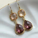 You will love these elegant glass teardrop earrings featuring faceted surfaces that catch the light beautifully. The rich blend of blush, champagne, and eggplant tones creates a sophisticated color palette perfect for any occasion. These stunning drop earrings showcase a mesmerizing shimmer that adds dimension and elegance to your jewelry collection. Lightweight and comfortable for all-day wear.