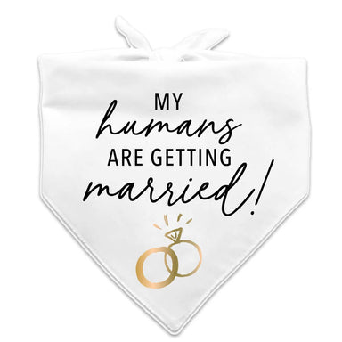 Let your furry friend celebrate the big day in style with this charming pet bridal bandana. Featuring crisp black lettering and elegant gold ring accents on a classic white background, it's the perfect way to include your beloved companion in wedding festivities. Whether your pup is a ring bearer, guest of honor, or simply part of the celebration, this bandana adds a touch of wedding magic to any pet's look. An ideal gift for pet-loving brides-to-be who want their four-legged family members to share in the 
