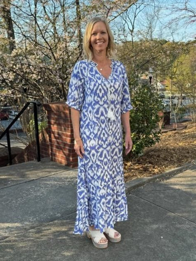 You will love the Remy V-Neck Casual Geometric Print Maxi Dress! Adorned with a beautiful abstract print, this dress is perfect for spring and summer with its sky blue and white color. The V-neck with tie and tiered skirt add a touch of elegance.