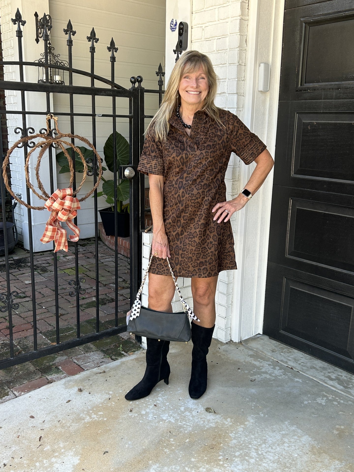 A striking leopard print dress crafted in luxurious faux suede with refined collar detailing at the V-neckline. Short sleeves feature meticulous stitching for added visual interest and dimension. Versatile enough to dress up with heels or with your favorite balck boots, this piece brings effortless sophistication to any occasion.

Carolee is wearing a size XSmall.

Material: 95% Polyester /&nbsp; 5% Spandex

Care Instructions: Gentle cool hand wash, dry flat