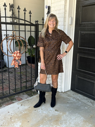A striking leopard print dress crafted in luxurious faux suede with refined collar detailing at the V-neckline. Short sleeves feature meticulous stitching for added visual interest and dimension. Versatile enough to dress up with heels or with your favorite balck boots, this piece brings effortless sophistication to any occasion.

Carolee is wearing a size XSmall.

Material: 95% Polyester /&nbsp; 5% Spandex

Care Instructions: Gentle cool hand wash, dry flat