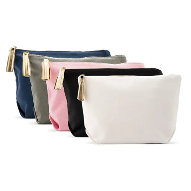 This large makeup bag is perfect for organizing all your cosmetics in one convenient place. Made of durable and lightweight canvas, it has a secure zipper closure and a stylish gold faux leather tassel. Choose from several colors to best match your style.  This is the perfect accessory for your bridal party. Add an extra touch with monogramming.  Dimensions: 11″ x 3.5″ x 7″  Care Instructions: Hand wash only, not suitable for machine wash or dry