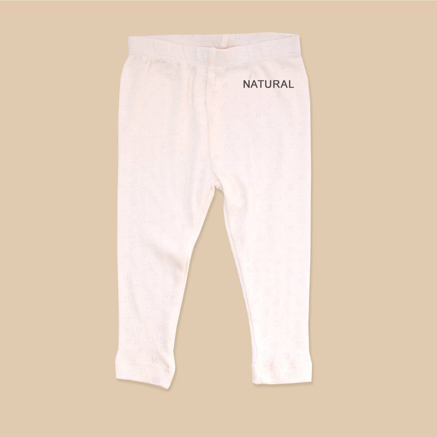 Wrap your little one in the ultimate comfort of our Knit Baby Legging Pants made from organic cotton. This ultra-soft and lightweight fabric is perfect for all seasons, and the adorable pattern adds a touch of cuteness. Keep your baby comfortable and stylish with these must-have leggings!  Machine wash and dry, durable and long lasting. Chemical free & non-toxic formulation, eco-friendly & sustainable. Ethically produced in India from small farmer sourced cotton. 