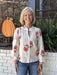 Discover effortless charm in this long sleeve floral print top, featuring a soft cream background with delicate pink florals. The button-up front and ruffled collar add vintage-inspired flair, while floral cuff detailing completes the look. Lightweight, this piece transitions seamlessly from day to night. A timeless wardrobe essential with personality.

Barbara is wearing a size Small.

Material: 100% Cotton

Care Instructions: Gentle cool hand wash, dry flat