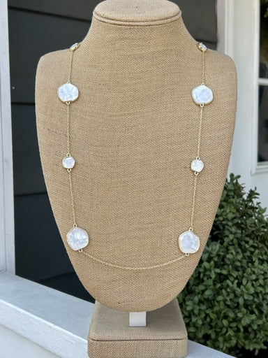 This elegant long necklace combines iridescent mother of pearl accents with a delicate gold chain for understated luxury. The extended length allows for layering or solo wear, making it a versatile addition to your jewelry collection. Perfect for adding a touch of sophistication to casual or formal occasions.

Approximate Length: 34-36"

Note: Silver N' Accessories jewelry is brass and stainless steel with rhodium and 18 KT gold plated. It's water resistant and anti tarnish, but it's recommended not to wear