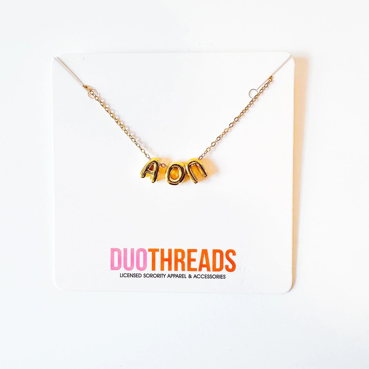 Celebrate your sorority sisterhood with this eye-catching Bubble Letter Necklace. Crafted in gleaming gold, oversized bubble letters make a bold statement while keeping your Greek pride front and center. The versatile design layers beautifully with other necklaces for a personalized look that captures the spirit of sorority life. Whether you're heading to chapter meetings, events, or just want to show your letters every day, this necklace is the perfect accessory to express your bond and belonging.

Measure