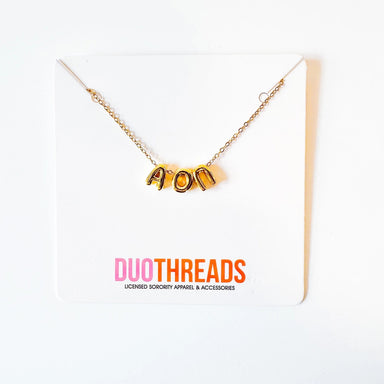 Celebrate your sorority sisterhood with this eye-catching Bubble Letter Necklace. Crafted in gleaming gold, oversized bubble letters make a bold statement while keeping your Greek pride front and center. The versatile design layers beautifully with other necklaces for a personalized look that captures the spirit of sorority life. Whether you're heading to chapter meetings, events, or just want to show your letters every day, this necklace is the perfect accessory to express your bond and belonging.

Measure