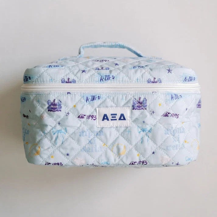 Celebrate your sisterhood with this thoughtfully designed sorority toiletry bag. Featuring your chapter's iconic Greek letters and signature symbols on the front, it makes a bold statement of pride and belonging. Compact yet spacious, it holds all your everyday essentials—perfect for campus, travel, or getting ready with your sisters. More than just a makeup bag, it's a keepsake that honors your bond, memories, and lifelong connection to your sorority.

Measurements: 10" x 7" x 6"