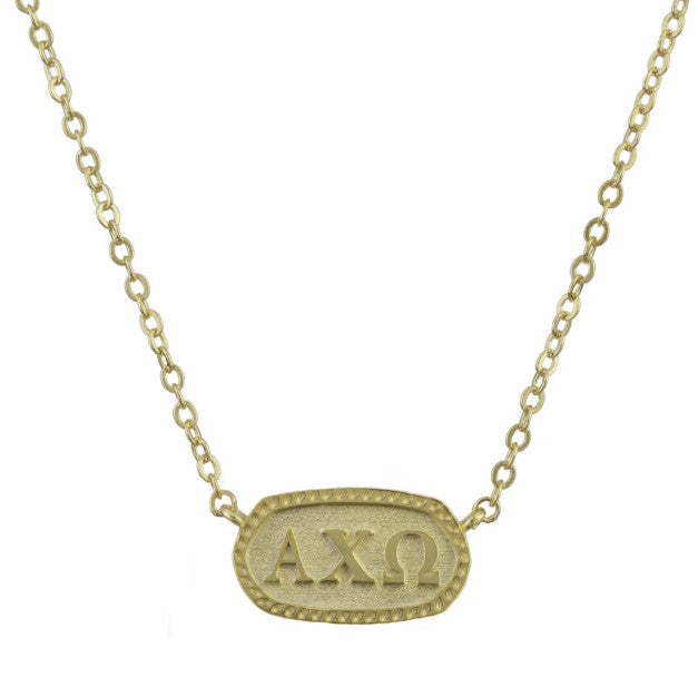 Show off your spirit with the Athena Sorority/Greek Necklace! Crafted with a 22k-yellow gold plate and featuring a lobster claw closure, this stunning accessory is perfect for a special gift. Let your Sorority pride and honor shine with the Phoebe necklace!  16" - 18" in length Oval measures 5/8"L x 3/8"W
