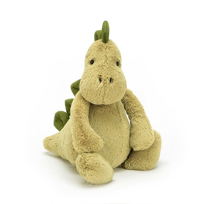 Introducing the Bashful Dino—the soft, squishy, and snuggly best friend for your little one! Colorful, mossy green, this dino's chunky stomper-feet and squishy spines invite your child to cuddle, hug, and play. Get ready for adventure with the Bashful Dino!  Details:  12"H x 5" W Suitable from birth Hand wash only; do not tumble dry, dry clean or iron. Not recommended to clean in a washing machine.