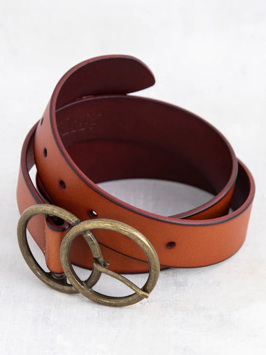 <p>Add a classic touch to your wardrobe with our Vegan Leather Adjustable Belt. This beautiful belt features a double hoop buckle and is perfect for pairing with your favorite jeans, pants, or even a jumpsuit. Made from high-quality vegan leather, it's a staple accessory that you can feel good about wearing.</p> <p>Details:</p> <ul> <li>1.5" Wide</li> <li>Small/Medium: 39" Long</li> <li>Large/XLarge: 43.25" Long