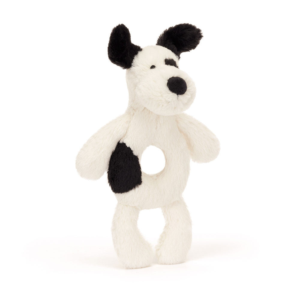 Introducing Rufferty, the adorable black and cream puppy ring rattle crafted for your baby's earliest explorations. This soft, plush companion features a perfectly sized circular grip that fits naturally in tiny hands, making it ideal for newborns and young infants. The gentle chime inside creates soothing sounds that encourage sensory development and auditory awareness. Shake, squeeze, and discover—Rufferty grows with your little one through those precious first months. A must-have for Jellycat devotees se