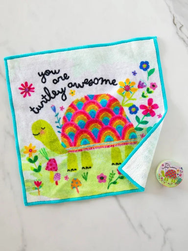 Transform an ordinary bath routine with this delightful expanding washcloth. Watch it magically unfold when water touches it—a simple pleasure that never gets old. Crafted from incredibly soft material, it becomes your go-to washcloth for daily use. Perfect as a thoughtful gift, it features charming sentimental design that brings a smile to any bathroom. This washcloth combines practicality with whimsy.

Measurements

Packaged: 1.75in W x 1in H
Expanded: 10in W x 10in H

Material &amp; Care

80% cotton, 16%