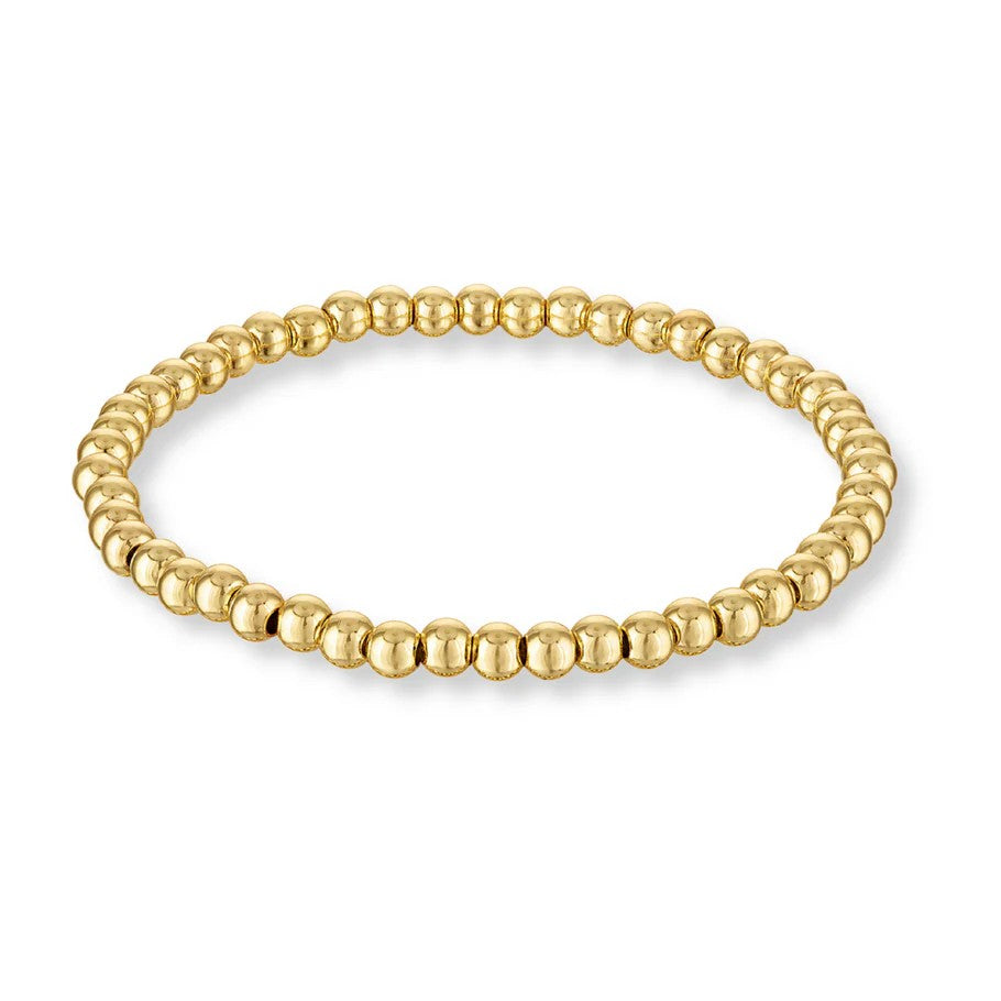This refined stretch bracelet embodies understated luxury with its 16K gold-over-brass construction and gracefully rounded beads. The seamless, polished finish delivers a sleek sophistication that transitions seamlessly from day to evening. Designed for comfort and versatility, it slips on effortlessly and pairs beautifully with any wardrobe. A timeless gift.

Slide on your favorite charms to express your unique personality, or stack multiple bracelets together for a bold, layered aesthetic. With numerous c