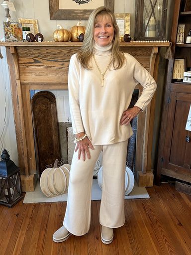 Introducing Clara, our super-soft turtleneck sweater. Layer it with your favorite pieces for a look that will keep you warm and stylish. The straight hem offers comfort and timeless fashion - perfect for any occasion. Experience luxury in every stitch.  CobbleStone Living is inspired by European travel but rooted in Georgia. Elegant fabrics and soft lines showcase a timeless look of Southern charm and European ease.   One size fits most Made in Italy 52% Viscose / 26% Polyester / 22% Polymide
