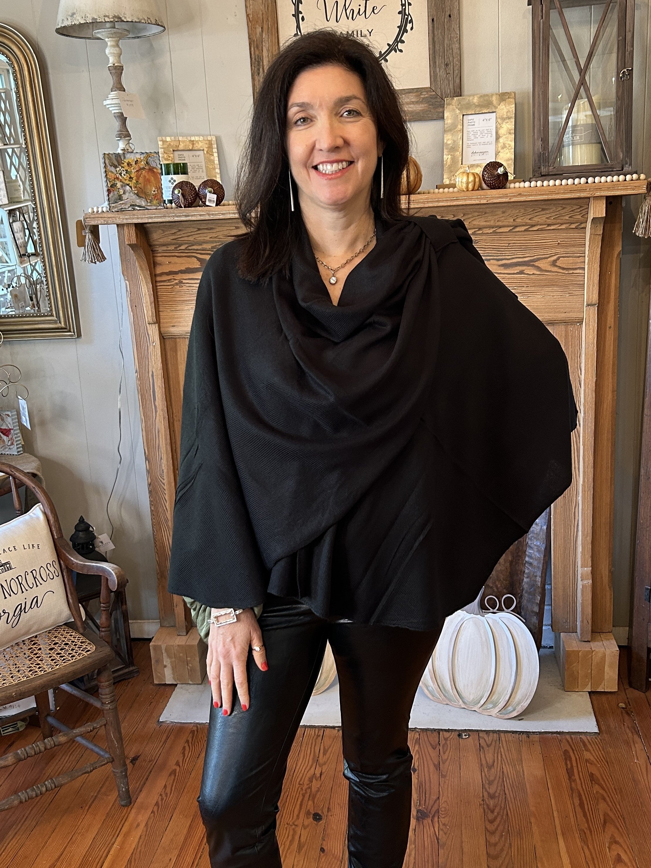 This lovely wrap offers both sophistication and warmth for an evening out. The loop feature gives this accessory a bit of elegance.  One size fits most.  Material: 100% Acrylic