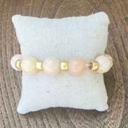 Add a pop of color and elegance to any outfit with our Colored Bead &amp; Gold Spacer Bracelets! Featuring larger colored beads and chic gold spacers, these bracelets can be dressed up or down for any occasion. Have fun with this beautiful combination!