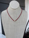Cheer in confidence with the Cassie Game Day Necklace. This short, striking piece features a rhinestone tube charm. Perfect for game day enthusiasts, it pairs effortlessly with team colors and casual wear alike. Lightweight, eye-catching, and designed to be your go-to accessory for every victory lap.