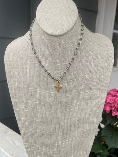 A beautiful crystal necklace with cross charm. The Austrian crystal beads alternate between the gold chain. The cross charm is a beautiful hammered matte gold. A beautiful, simple piece.