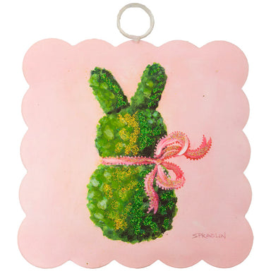 Bring springtime charm to your home with this delightful Mini Scallop Art featuring an adorable boxwood bunny design against a soft pink background. Perfect for Easter celebrations or year-round spring décor, this piece showcases elegant scalloped edges that add a touch of sophistication. Designed for easy wall display, it's an ideal accent for bedrooms, nurseries, or entryways. A sweet way to celebrate the season with timeless appeal.

Dimension 1:&nbsp;6" x .5" x 7"

Artist Profile: Roxanne Spradlin, a Te