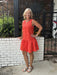 You will love our vibrant orange sleeveless dress featuring a charming drop tier skirt and faux button front detail. Lined for comfort with a back zipper for easy wear. Versatile enough for game day casual paired with sneakers, or elevated with sandals and accessories for a polished look. Perfect for spring and summer occasions. Pair with a skinny scarf or denim jacket for cool evenings.


Barbara is wearing a Small.

Material: 95% Cotton / 5% Spandex; Lining: 100% Polyester

Care Instructions: Gentle cool 