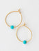 Tiny but mighty, these turquoise hoops pack personality into a lightweight design. The soft turquoise stone pairs perfectly with warm gold accents, creating an effortless look that transitions from day to night. Supremely comfortable for all-day wear, they're ideal for stacking or wearing solo. A versatile essential that brings just the right touch of color to any ensemble.

Details:

hypoallergenic copper, real gemstones
.5in diameter