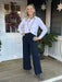 Experience incredible comfort in Erin Wide Leg Denim. Our patented 4-way stretch Knit Denim moves with you without compromising on style or a perfect fit. The concealed waistband, back patch pockets with gunmetal studs, and extra-wide leg without side seams flatter your figure. A cropped, ankle length and raw-edge hem give you the freedom to personalize the perfect length. Enjoy all-day comfort and bold style with Erin Wide Leg Denim!  Knit Denim- 95% Cotton, 5% Spandex Lyssé Fit 360° Smoothing