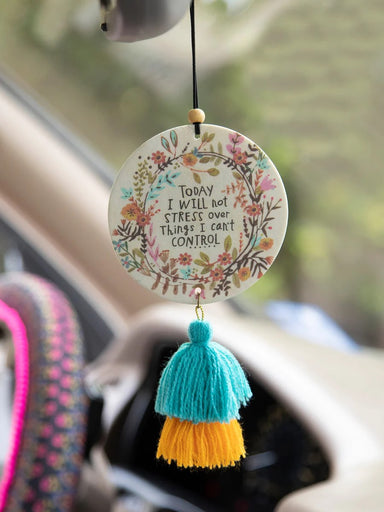 Introducing our Car Air Fresheners, perfect for any small space. These beautiful designs are scented with essential oils, bringing a fresh and delightful aroma wherever you go. Whether it's in your car, laundry room, closet, RV, or dorm, our eye-catching graphics and positive messages will inspire and uplift your mood.

Pressed paper with essential oils and natural and artificial preservatives, exclusive of trim. Phthalate free