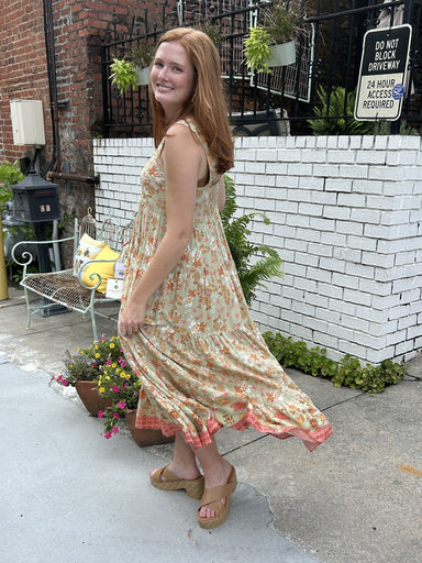 This lovely Floral Tiered Maxi Dress is the perfect spring/summer dress! The beautiful sage color, floral design, and tiered feature make it a must-have for any wardrobe. With wide shoulder straps and a lined design, it offers a beautiful fit.  Material: 100% Rayon  Care Instructions: Hand wash cold, line dry