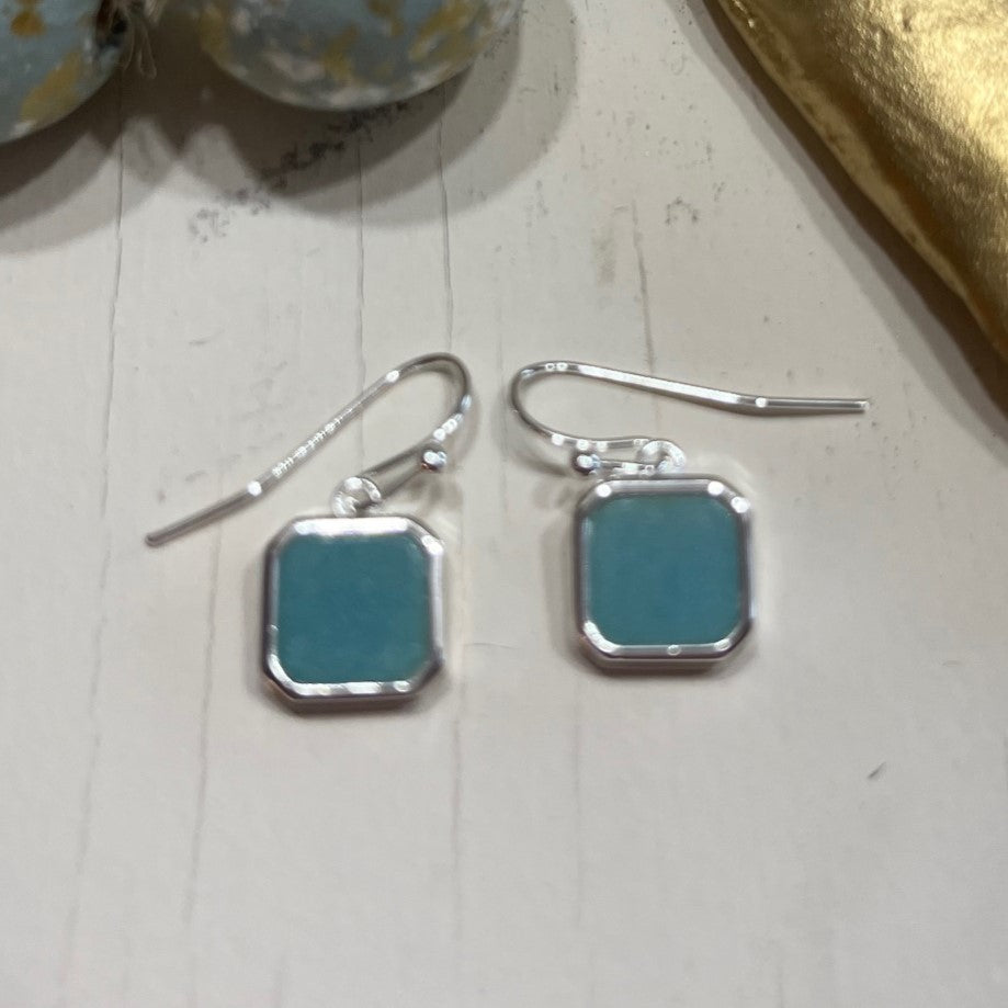 <p>You will love our eye-catching Florence Earrings featuring a beautiful square amazonite pendant. These versatile earrings can easily elevate any outfit, whether it's for a casual day or a dressy occasion.</p> <p><span style="font-size: 0.875rem;"></span>Details:</p> <ul> <li>made with natural amazonite</li> <li>hypoallergenic, no nickel/lead</li> <li>anti-tarnish coated</li> </ul>