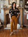 Feel your most confident with these high waist button front pocket pants. The beautiful camel color and gold accent buttons make them perfect for fall. The high waist and wide leg fit provide a flattering silhouette. Look amazing!  Material: 100% Cotton  Care Instructions: Hand wash cold, flat dry 