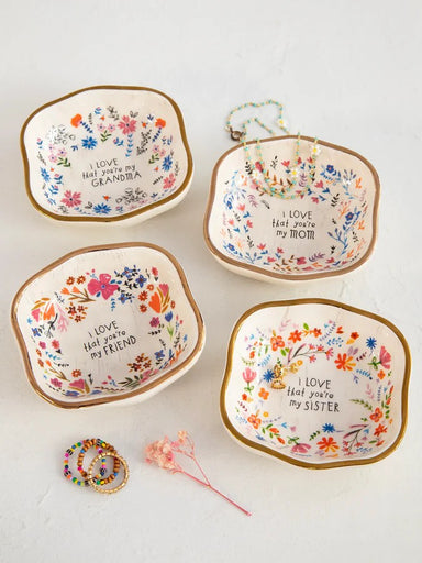 A timeless keepsake that celebrates meaningful moments. This antiqued trinket bowl features an elegant gold-rimmed edge and delicate surface texturing that evokes vintage charm. Perfect for holding jewelry, coins, or small treasures, it's a thoughtful gift that keeps you in their heart every single day. Each piece carries the warmth of a personal touch—a reminder of your connection.

Dimensions: &nbsp;3.5in L x 3in H x 1.2in H

Material &amp; Care

Ceramic
Hand wash, Not Recommended For Dishwasher, Do Not M