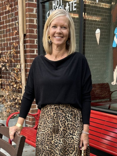 Introducing the Anywhere Top - the ultimate go-to piece for effortless style! With a versatile design, wear it on or off the shoulder and style it tucked into denim or tailored pants for a chic and put-together look. Perfect for any occasion with its long sleeves for added comfort.&nbsp;

Material: 62% Polyester / 33% Rayon / 5% Spandex

Care Instructions: Hand wash cold water, hang or line dry