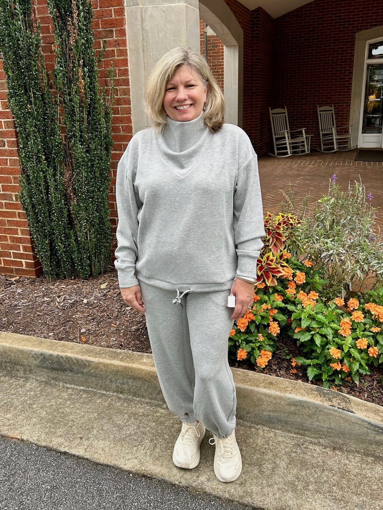 These Heather Gray Jogger Pants combine softness and coziness with practical design. Featuring an elastic waist and cuffs for a comfortable fit and convenient side pockets, they are perfect for everyday wear. A versatile staple, these joggers effortlessly blend comfort and style to keep you feeling great all day long.

Paula is wearing a size Medium.

Pair with our matching "Cowl Neck Sweatshirt".

Material: 48% Modal / 48% Polyester / 4% Spandex

Care Instructions: Hand wash separately in cold water, hang 
