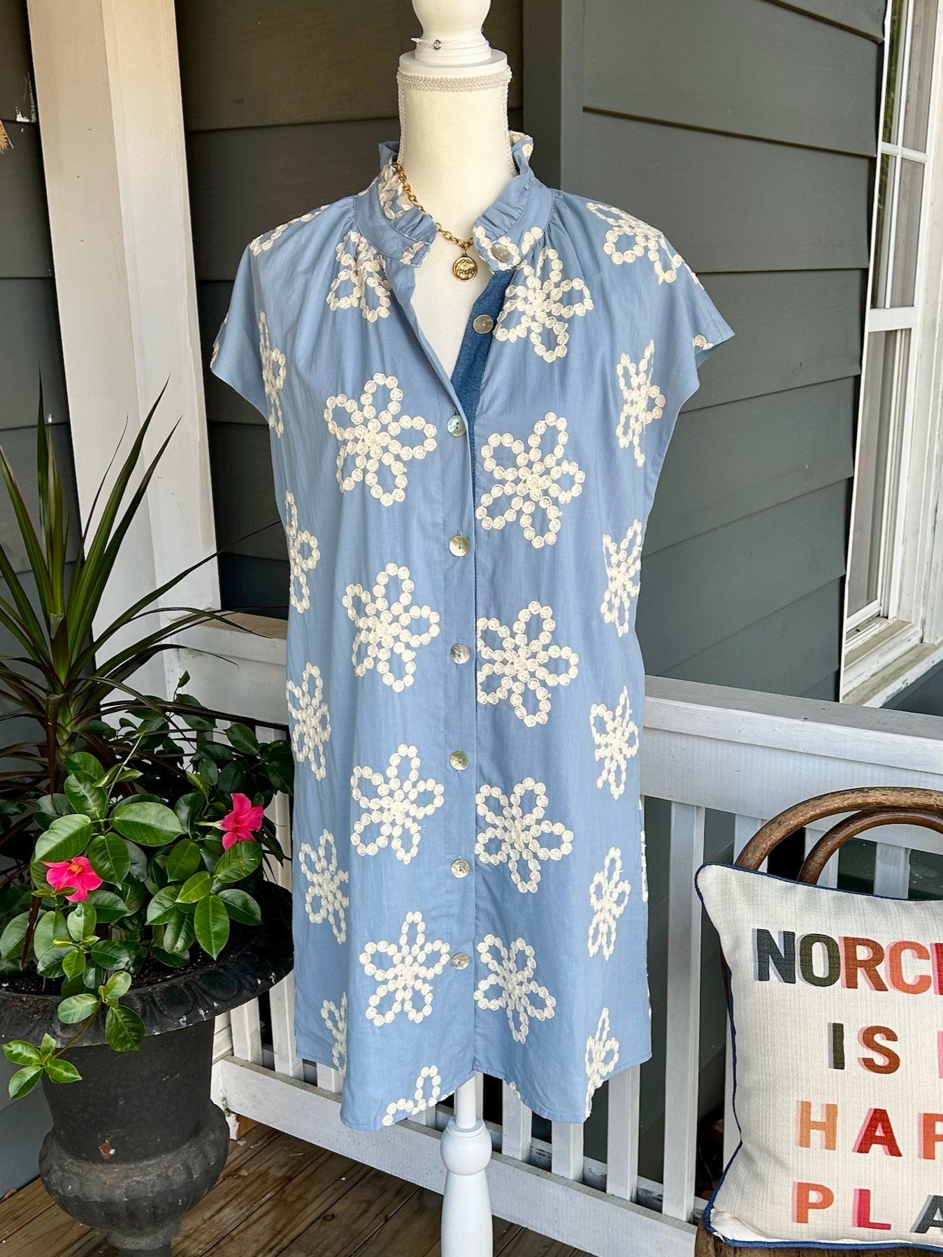 This elegant dress features delicate cap sleeves and a flattering button-up front, combining comfort with style. Its beautiful medium blue fabric is enhanced by intricate cream embroidery, inspired by Asian design elements for a unique, sophisticated look. Fully lined for a smooth fit, this dress is perfect for making a graceful statement at any occasion.

Material: 100% Cotton

Care Instructions: Gentle cool hand wash, dry flat