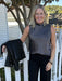 This stunning Justine Draped Mock Neck Shell Top in a beautiful Gray Ash color is the perfect addition to any wardrobe. With its silky feel and sleeveless design, it's both comfortable and dressy. The draped neck adds an elegant touch, making this top a must-have.

Material: 100% Polyester


Care Instructions: Machine wash cold, line dry