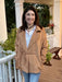 This camel-colored coat features a classic collar and a stylish tie waist, creating a flattering silhouette. Crafted from a very soft fabric, it offers both comfort and a luxurious feel. Its trendy short cut makes it a versatile piece that pairs effortlessly with any outfit, while the warm neutral tone ensures timeless elegance.

Material: 100% Polyester

Care Instructions: Hand wash on cold water, lay flat to dry