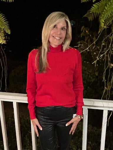 This long sleeve sweater top in vibrant red features elegant gold button accents that add a touch of sophistication. Designed with a cozy turtleneck and snug cuff and waistband, it offers a flattering fit while remaining lightweight for all-day comfort. Perfect for layering or wearing on its own, it’s a versatile addition that elevates any outfit.

Material: 80% Viscose / 20% Spandex

Care Instructions: Hand wash cold, line dry