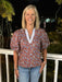 This Floral Print Puffed Sleeve Top features delicate puffed sleeves and a stylish contrasting placket that adds a playful touch. Crafted from lightweight fabric, it offers comfort and breathability, making it an ideal transition piece to effortlessly brighten your wardrobe across seasons. Perfect for adding feminine charm to any look.

Material: 100% Cotton

Care Instructions: Hand wash cold, line dry