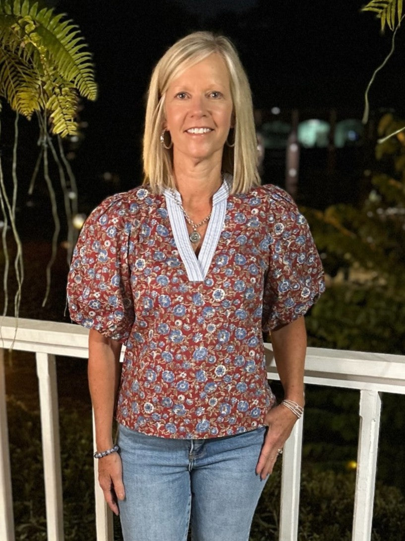 This Floral Print Puffed Sleeve Top features delicate puffed sleeves and a stylish contrasting placket that adds a playful touch. Crafted from lightweight fabric, it offers comfort and breathability, making it an ideal transition piece to effortlessly brighten your wardrobe across seasons. Perfect for adding feminine charm to any look.

Material: 100% Cotton

Care Instructions: Hand wash cold, line dry