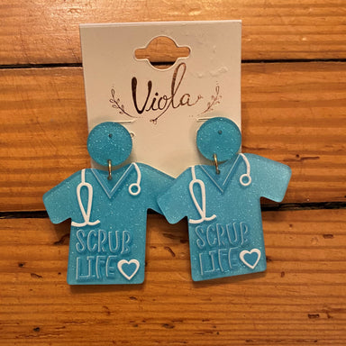 Show off your nursing pride with these stylish "SCRUB LIFE" Nurse Earrings. These post earrings are made of acrylic and make a great addition to any medical professional's wardrobe. They make a great gift for any nurse who wants to show off their profession. Colors: Blue, Hot Pink and Light Pink.