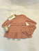 Dress your little one in charming elegance with this deep dusty rose long sleeve baby dress. Featuring delicate ruffles on the bodice and tiered hem, it adds a touch of sweetness to any occasion. The included bloomers ensure comfort and complete the adorable look, making it perfect for both everyday wear and special moments.

Accessories not included.