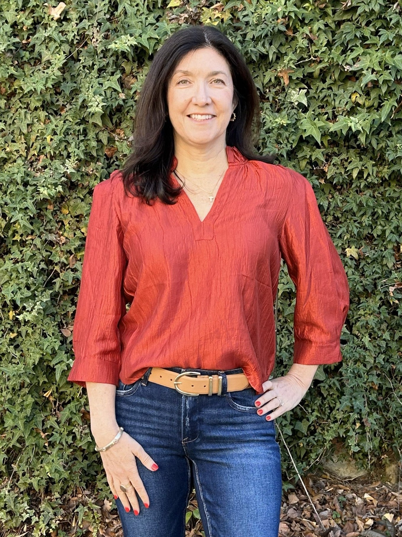 This cinnamon top is your answer to effortless style with serious impact. The shimmering fabric adds a touch of glamour that transforms any outfit, while the V-neck and ruffled collar create a refined, flattering neckline. Three-quarter sleeves strike the perfect balance between coverage and contemporary flair. Pair with jeans for relaxed sophistication or dress it up for evening events. A versatile essential that delivers both polish and personality, this top makes looking your best feel completely natural