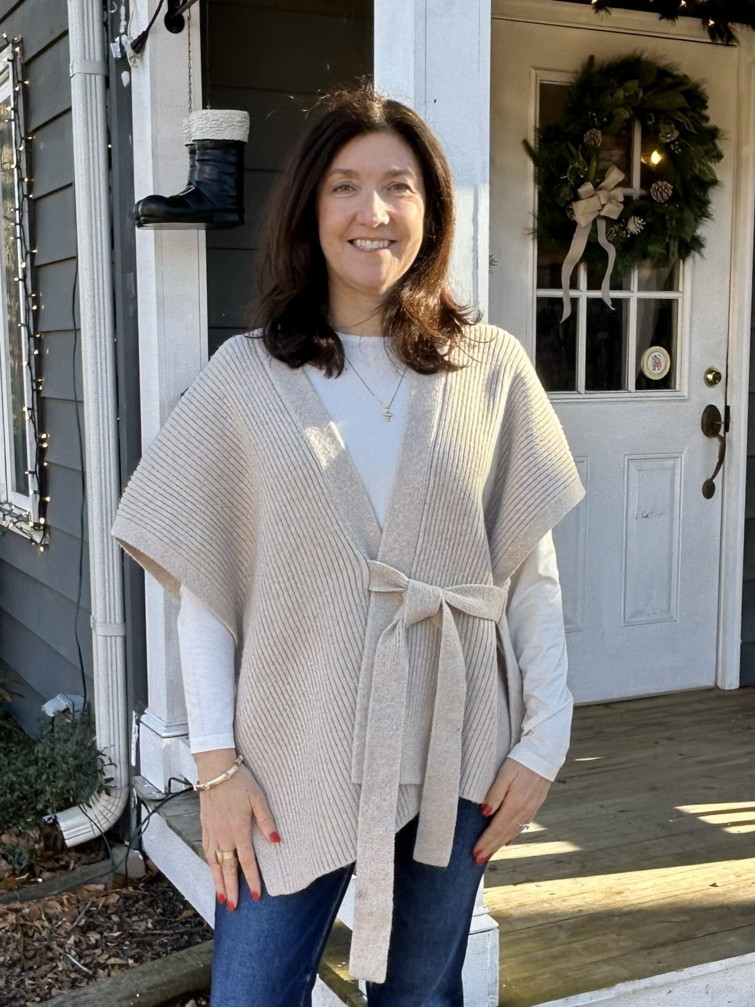 This sleeveless wrap cardigan in a gorgeous oat hue is the layering piece you've been searching for. Its distinctive wrap construction creates a unique flare, great for layering. The soft knitted fabric moves with you while adding warmth and polish to any ensemble. Whether you're dressing up or keeping it casual, this versatile cardigan instantly enhances your look.

Material: 97% Polyester / 3% Spandex

Instructions: Gentle cool hand wash, dry flat