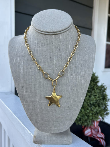 Enhance your style with this timeless chain linked necklace featuring a beautiful star pendant. The larger chain pieces sets the star off perfectly. The gold linked chain adds a touch of elegance to any outfit.&nbsp;

17-19" in length