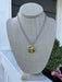This versatile mixed metal necklace effortlessly transitions from casual to dressy occasions. One side features a delicate raised cross, while the reverse showcases a charming raised heart—giving you two meaningful designs in one piece. The thoughtful metal blend complements any wardrobe, making it the perfect everyday accessory that works with virtually everything you own. Layer it, wear it solo, or flip it to match your mood.